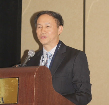 金永興主席代表國際海事教師聯合會宣讀國際海事組織秘書長關水康司先生的賀信